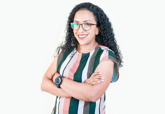 Portrait of attractive afro girl with arms crossed isolated Smiling afro girl with arms crossed looking at camera Nicaraguan woman on isolated background