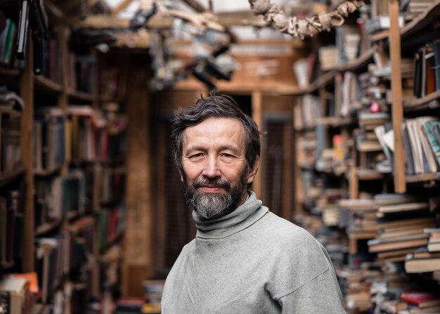 Portrait of authentic old man with beard and good eyes