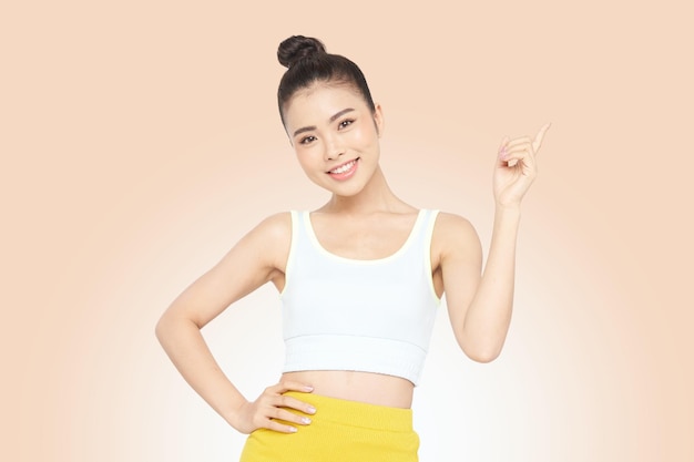 Portrait banner of a young Asian with hand gesture, isolated on background