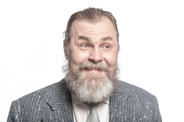 Portrait of bearded man in gray jacket