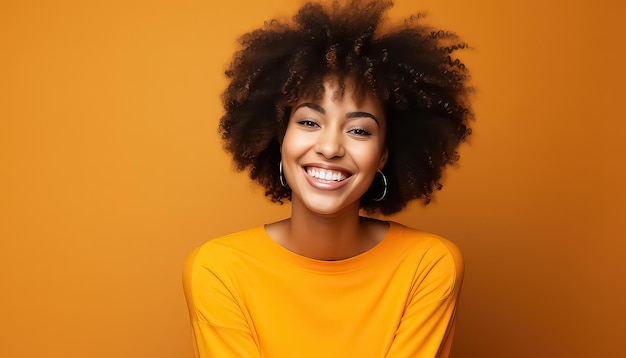 portrait of beautiful african woman standing against orange background