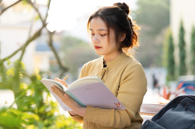 Portrait of a beautiful Asian female student at university