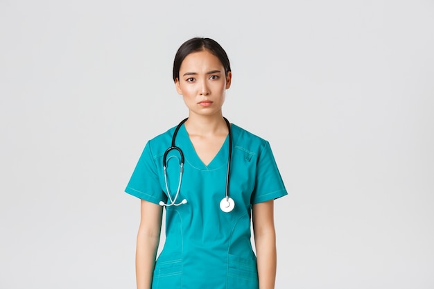 Portrait of a beautiful Asian nurse posing