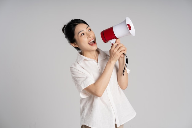 Portrait of beautiful asian woman posing on white background