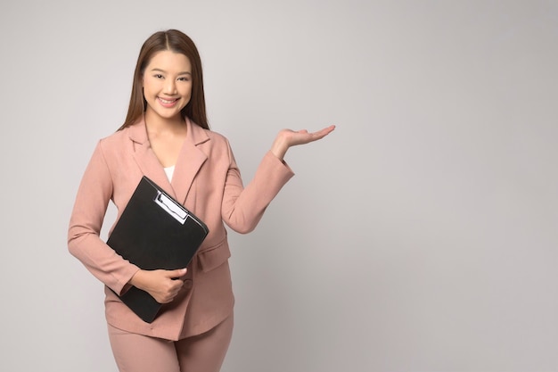 Portrait of beautiful asian woman over white background studio