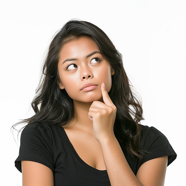 Portrait of a beautiful Asian woman with a thinking look and looking up