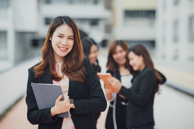 Portrait of a beautiful authentic satisfied business woman looking at camera