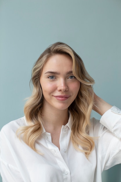 Portrait of beautiful blond woman with trendy hairstyle