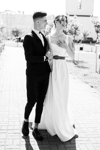 Portrait of beautiful bride with wedding bouquet Black and white photo