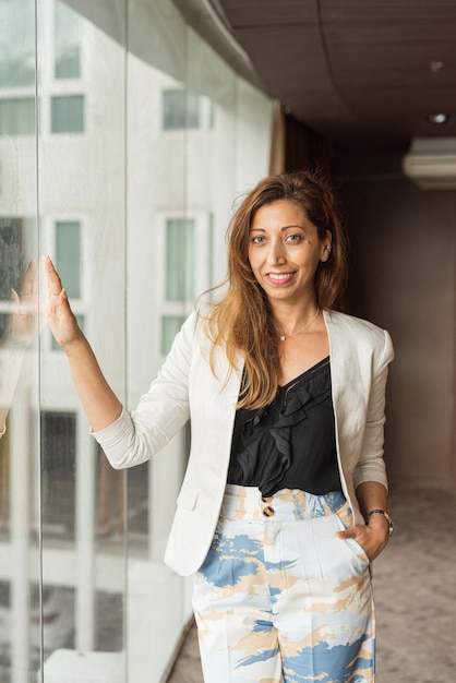 Portrait of beautiful businesswoman smiling in office