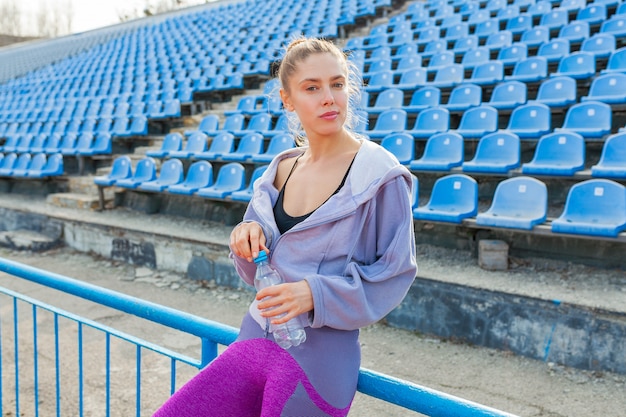 Portrait of a beautiful Caucasian girl athlete in the morning run