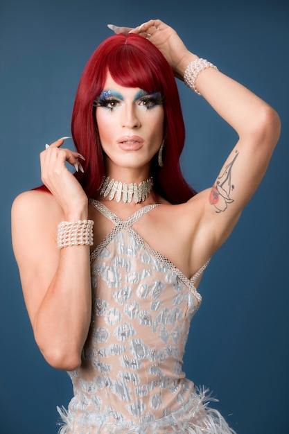 Portrait of beautiful drag person wearing makeup and wig