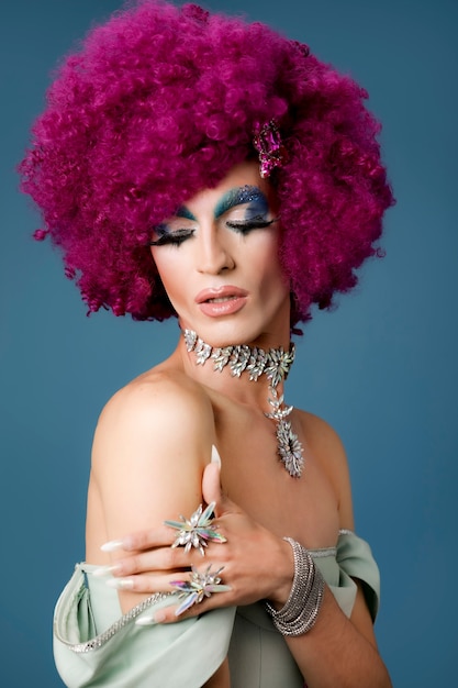 Portrait of beautiful drag person wearing makeup and wig