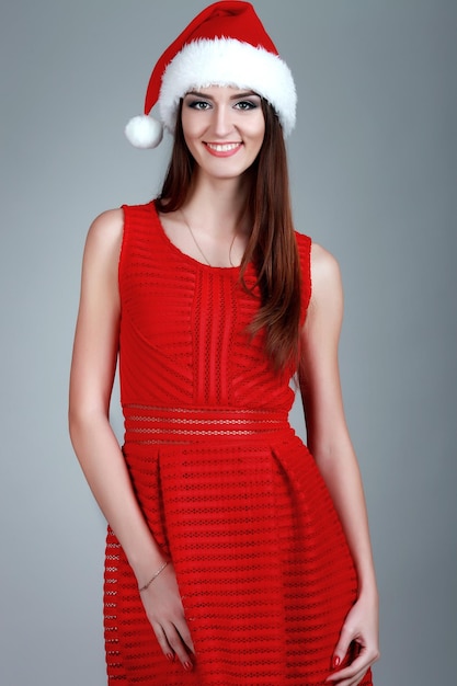 Portrait of beautiful female model wear santa hat