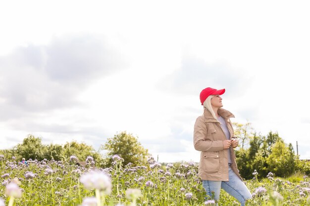 Portrait of beautiful girl in field