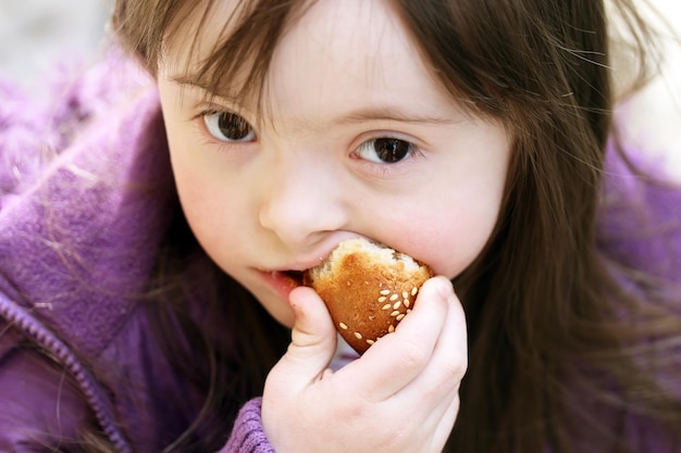 Portrait of beautiful girl that eating baguette