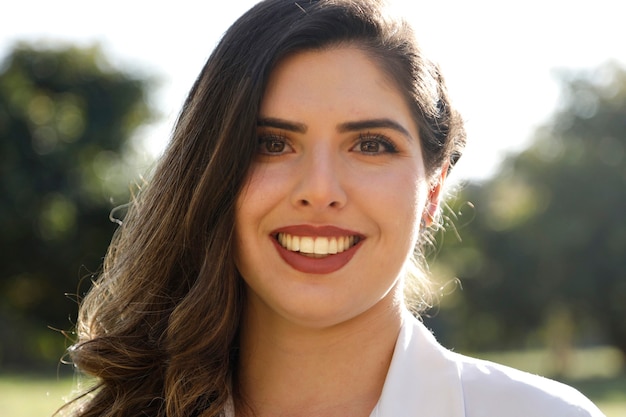 Portrait of a beautiful girl wearing a lab coat