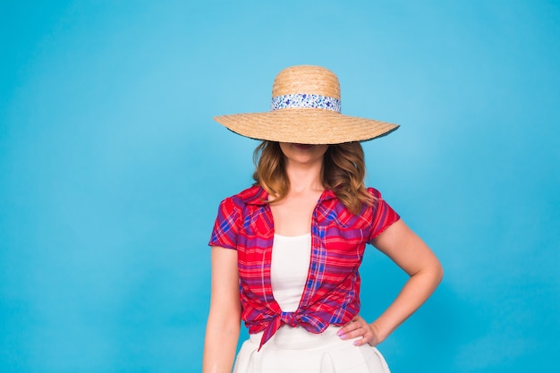 Portrait of a beautiful graceful woman in elegant hat with a wide brim. Beauty, fashion concept.