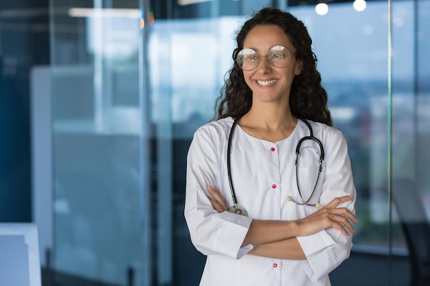 Portrait of a beautiful latin american female doctor doctor in working in a modern clinic office