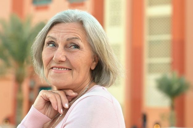 Portrait of a beautiful  old woman on a walk