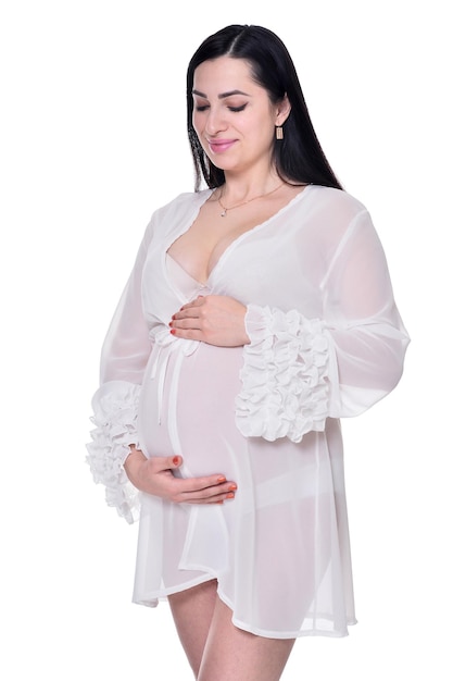 Portrait of beautiful pregnant woman posing isolated on white background