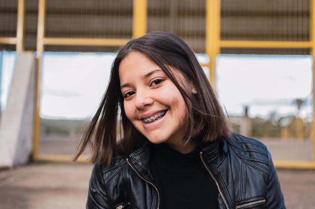 Portrait of a beautiful smiling adolescent girl.