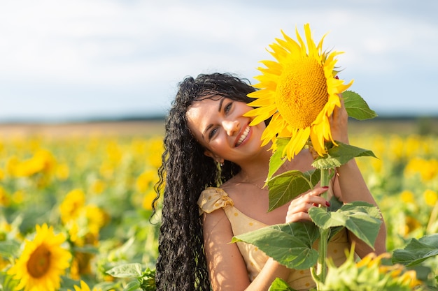 Portrait of a beautiful smiling dark-haired woman