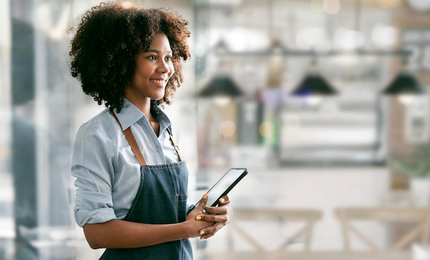 Portrait of a beautiful smiling female small business owner