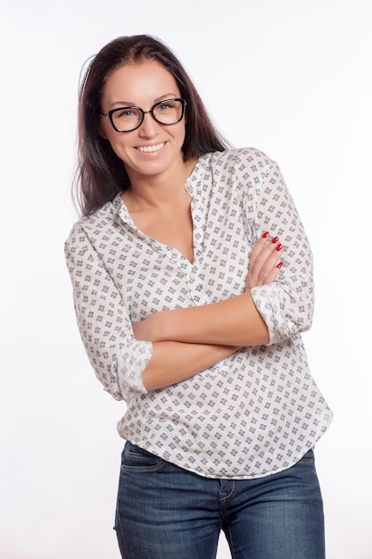 Portrait of beautiful smiling woman in modern hipster glasses.