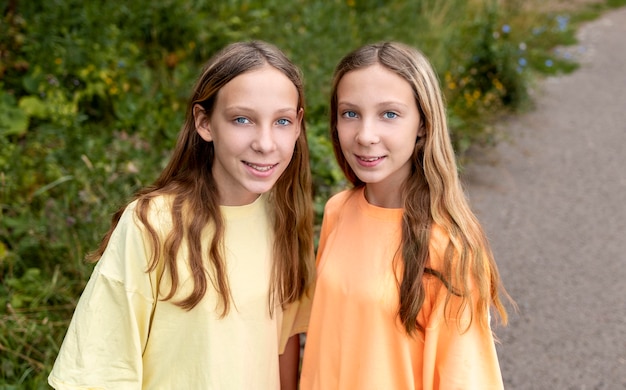 Portrait of beautiful twin sisters