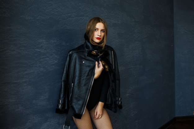 Portrait of beautiful woman in a black leather jacket