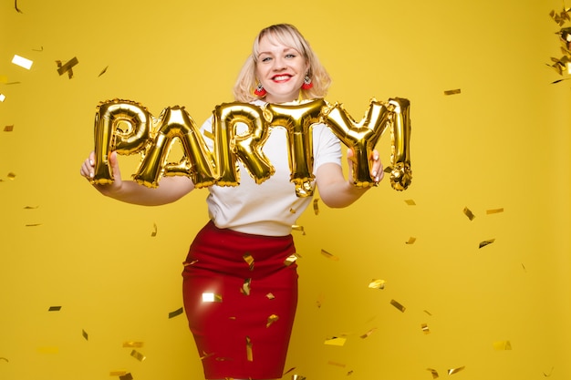 Portrait of beautiful woman celebrating a party and having fun