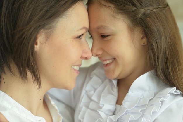 Portrait of a beautiful woman and girl