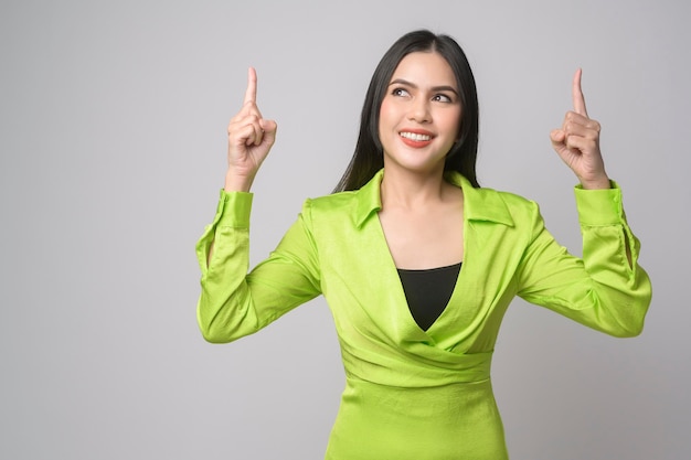 Portrait of beautiful woman over white background studio