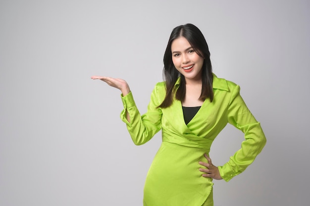 Portrait of beautiful woman over white background studio