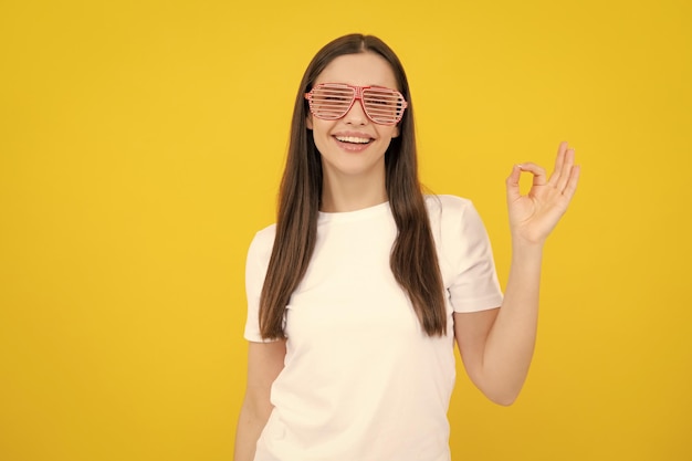 Portrait of beautiful woman with funny glasses Celebration and party Girl having fun portrait