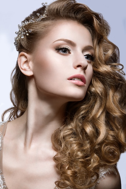 Portrait of a beautiful woman with jewelry in her hair