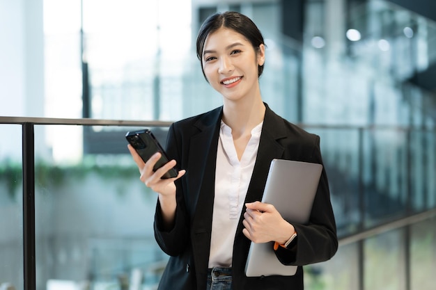 Portrait of a beautiful young Asian businesswoman at the company