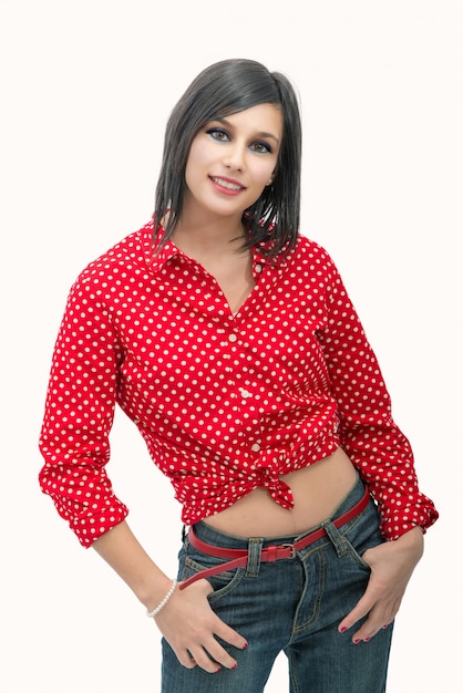 Portrait of a beautiful young brunette with red shirt