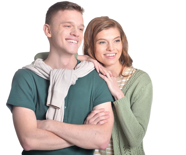 Portrait of a beautiful young couple on a white background