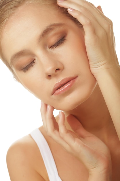 Portrait of beautiful young girl with clean skin