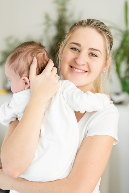 Portrait of beautiful young mother with her child