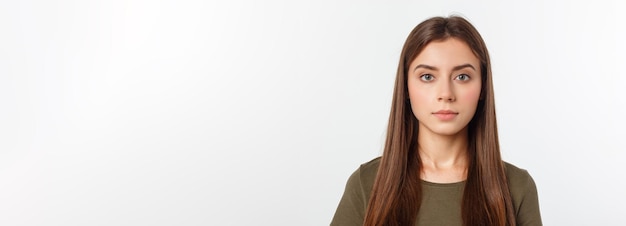 Portrait of a beautiful young woman looking at the camera and smiling isolated on a white background