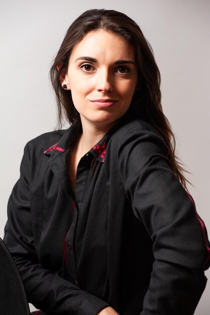 portrait of a beautiful young woman wearing fashion clothing. studio shot on white background.