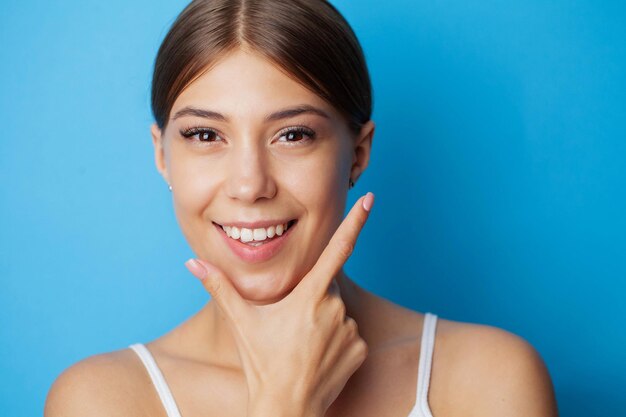 Portrait of beautiful young woman with perfect smile.