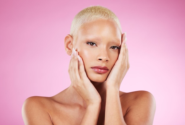 Portrait beauty and edgy with a model black woman in studio on a pink background for makeup or cosmetics Face skincare or natural with a unique and attractve young female indoor for cosmetic care