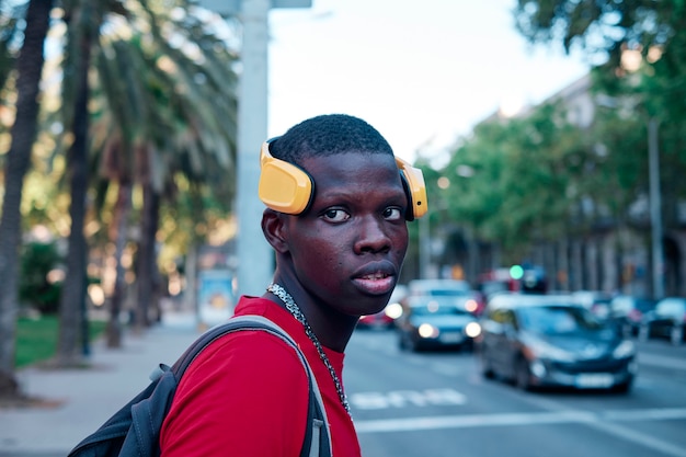 Portrait of a black boy in the city - concept portrait