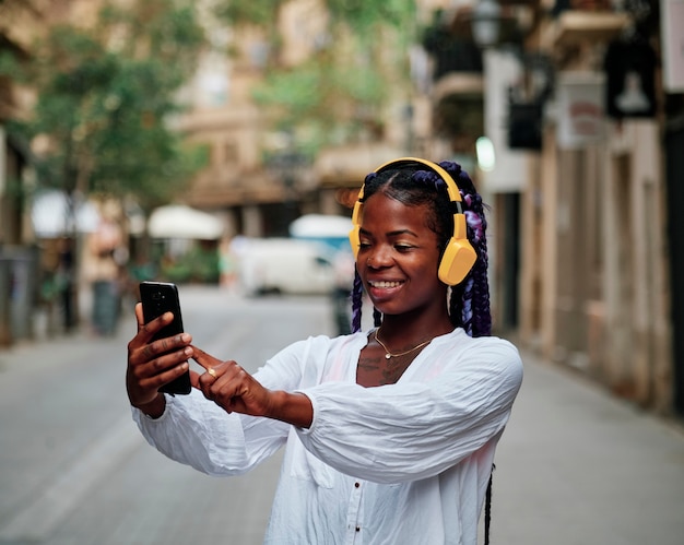 Portrait of a black girl walking in the city