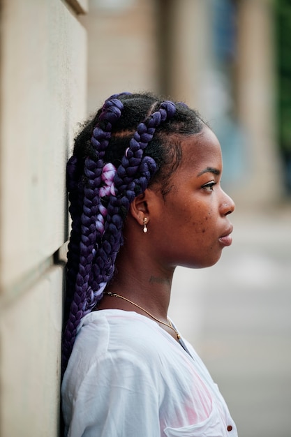 Portrait of a black girl walking in the city