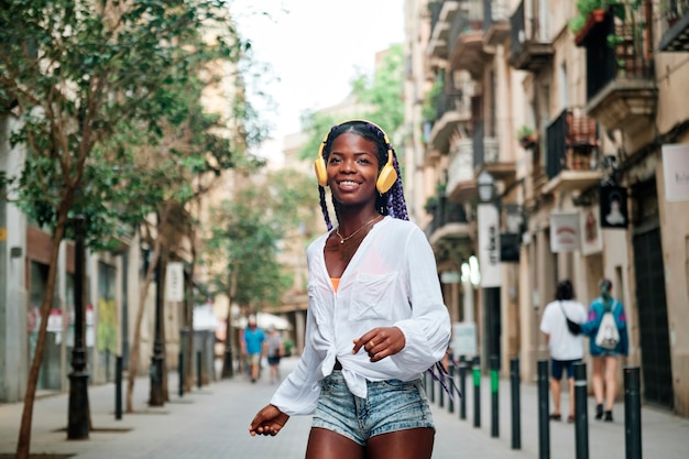 Portrait of a black girl walking in the city